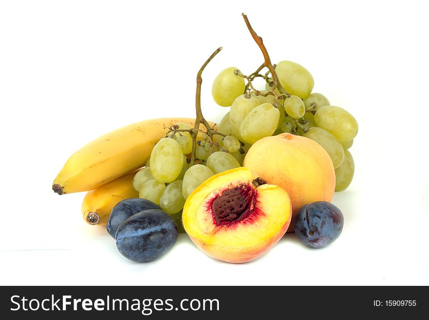 Many fruits isolated on white background.