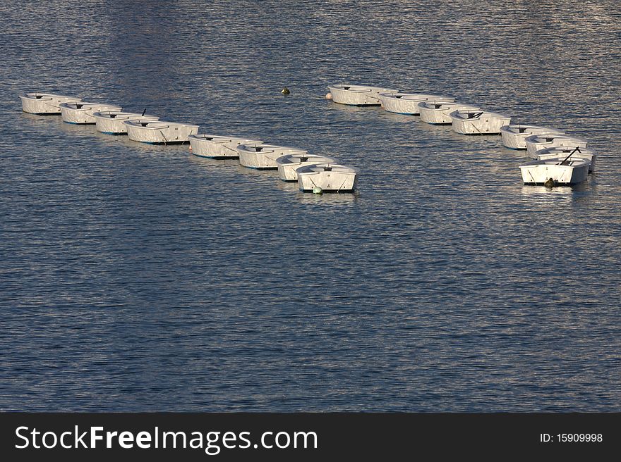 Two columns of small boats