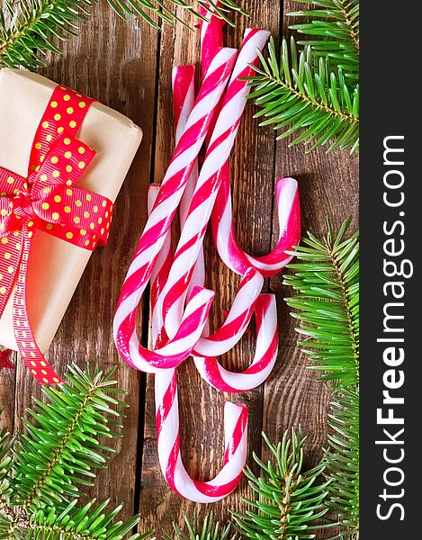 Candy canes on a table, christmas background