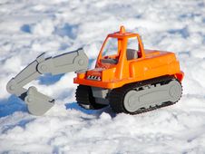 Toy Excavator In The Snow Stock Photo Toy Excavator In The Snow Stock Photo