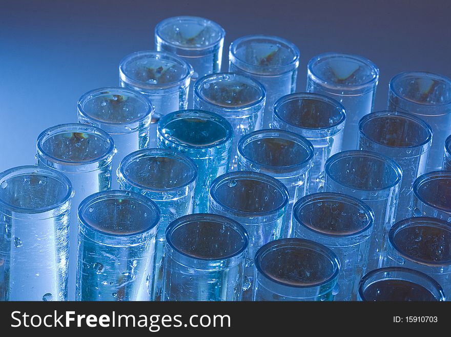 Set of test tubes on a blue background.