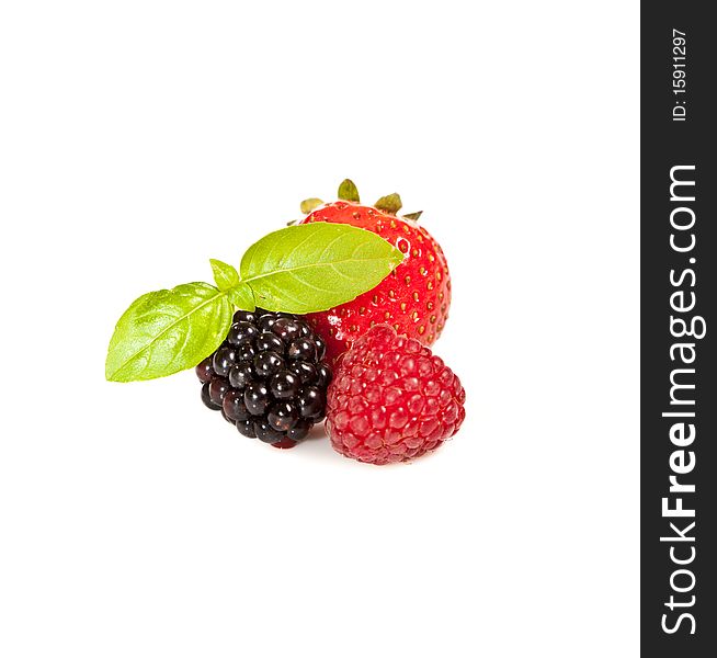 Ripe Black and red raspberries on white isolated background