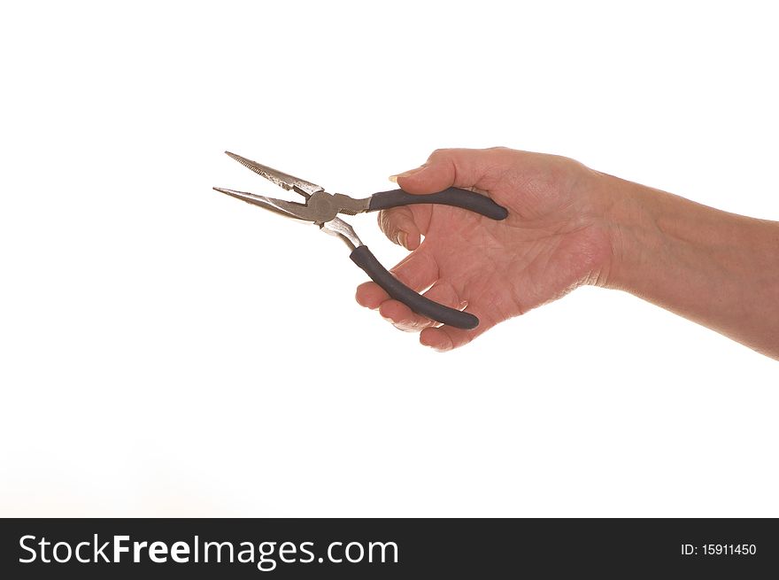 Handing holding out a pair of long nosed pliers. Handing holding out a pair of long nosed pliers
