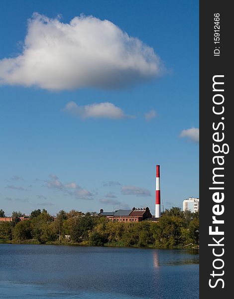 Russia, provincial city, buildings and boiler-house on riverside