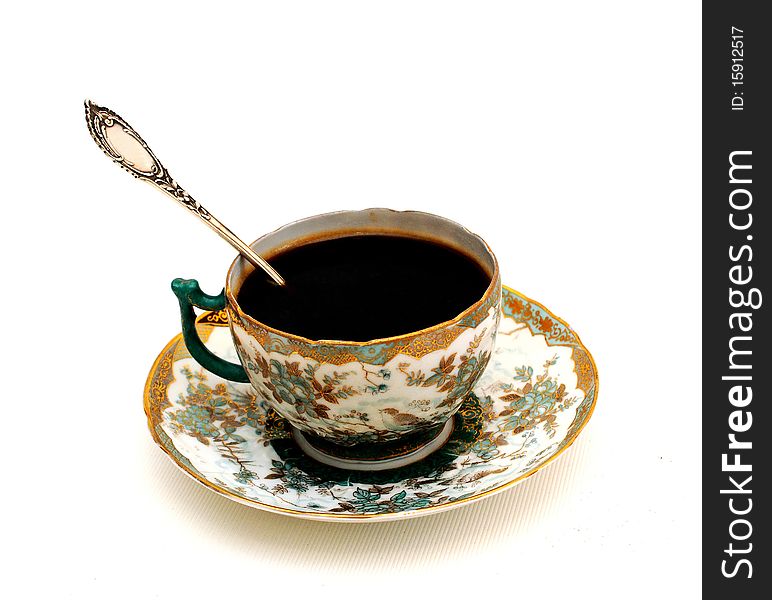 Coffee in an ancient cup. Coffee in an ancient cup