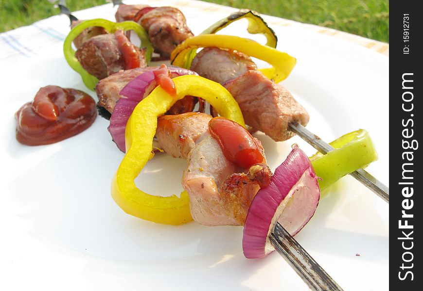 Cooked meat with pepper onion roasting on plate. Cooked meat with pepper onion roasting on plate