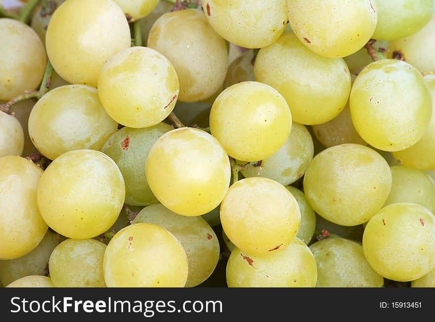 Ripe yellow grapes on the market