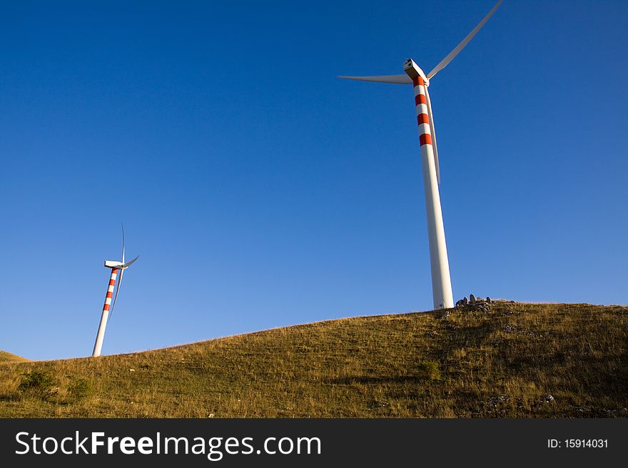 Windmill in the mountains of italy to produce energy. Windmill in the mountains of italy to produce energy
