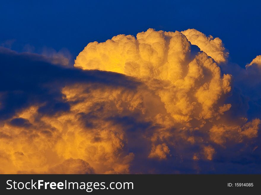 Cloud in warm light of sunset