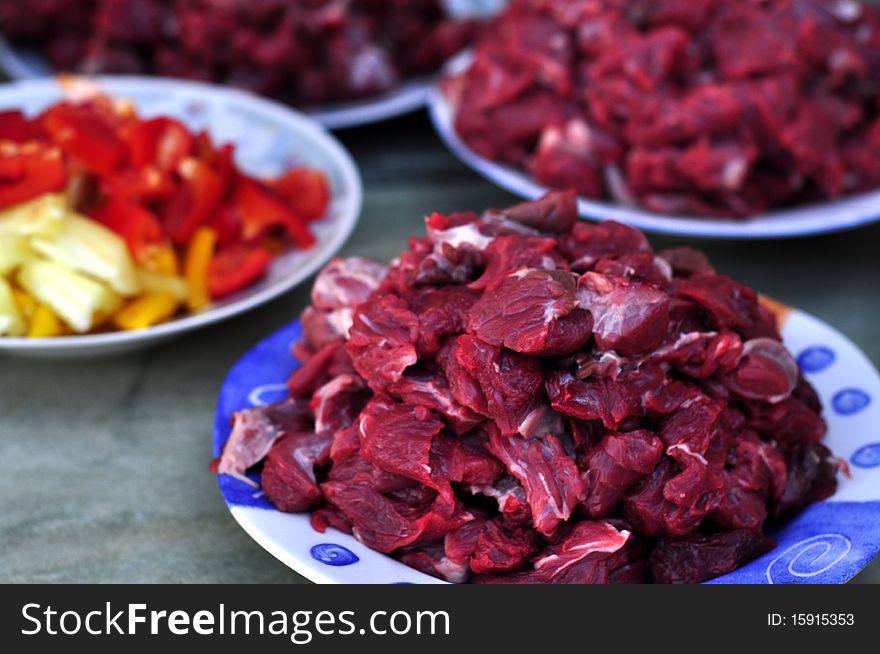 Sliced raw beef prepared for cooking. Sliced raw beef prepared for cooking