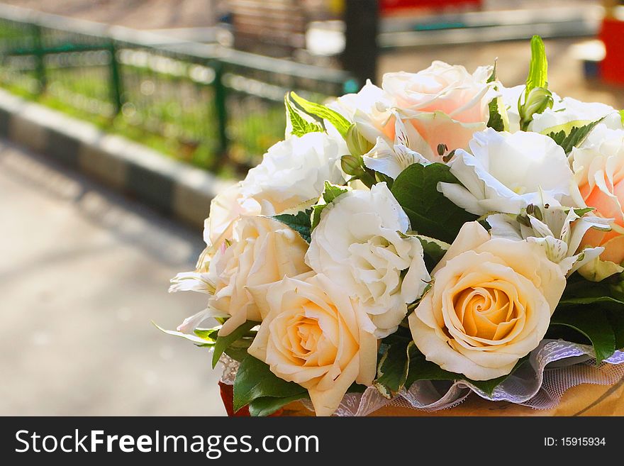 The image of flowers bouquet under the blured background