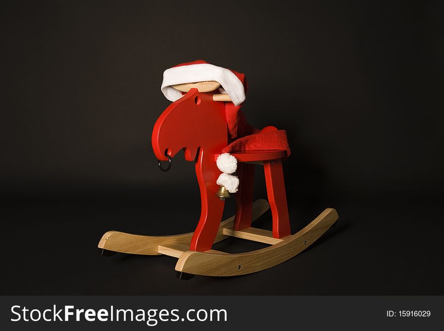 Rudolph the red nosed reindeer in santa hat. Rudolph the red nosed reindeer in santa hat