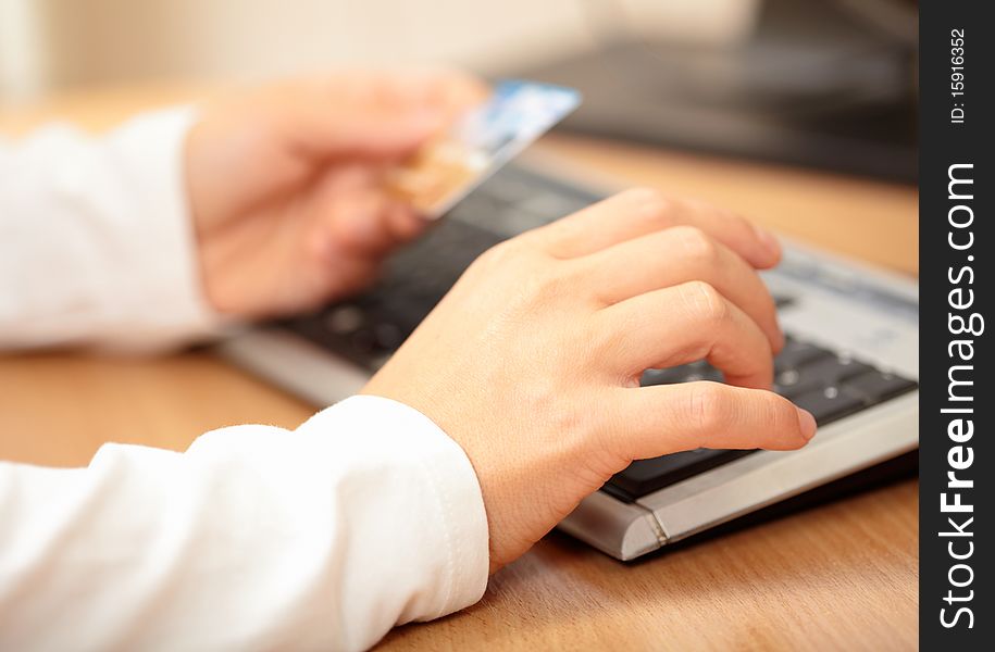 Hand typing on laptop keyboard. Shallow DOF. Hand typing on laptop keyboard. Shallow DOF