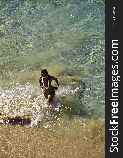 Young polynesian woman at makena beach in maui, hawaii. Young polynesian woman at makena beach in maui, hawaii