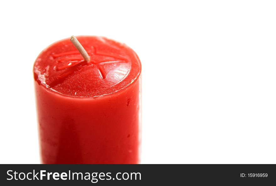 Red candle isolated on white background.