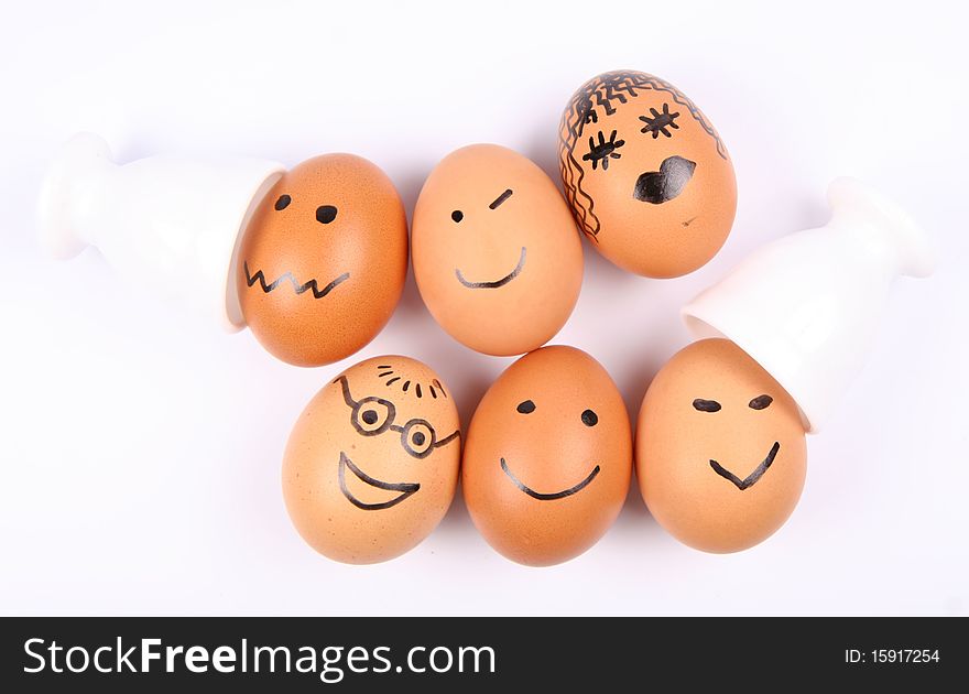 Eggs with smiling faces on white background. Eggs with smiling faces on white background