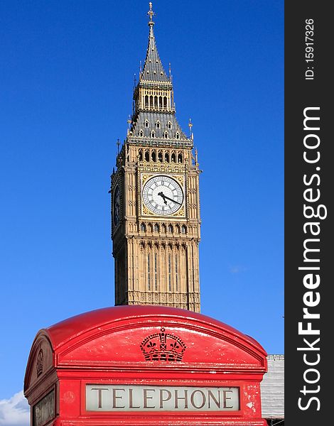 Famous Big Ben clock tower with phone booth in Lon