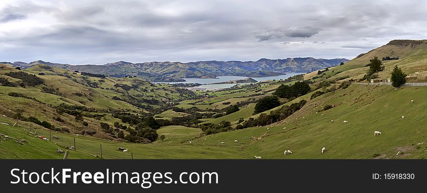 Panoramic view of mountains and bay near Okaroa, New Zealand. Composite of 8 separate images. Panoramic view of mountains and bay near Okaroa, New Zealand. Composite of 8 separate images.