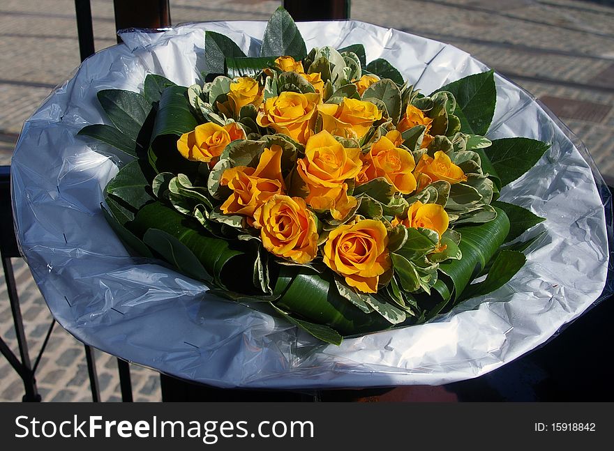 A beautiful flower bouquet of yellow roses. A beautiful flower bouquet of yellow roses.