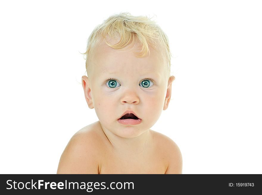 Blond-haired one year baby on white background. Blond-haired one year baby on white background