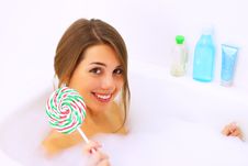 Girl Relaxing In Bathtub Stock Images