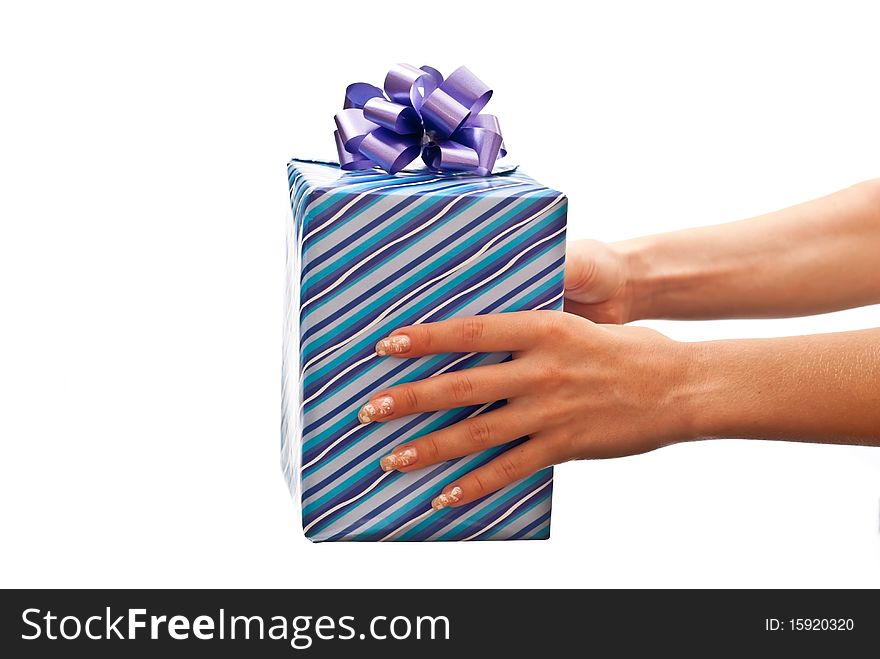 Woman giving a present in the blue box with bow. White background. Woman giving a present in the blue box with bow. White background