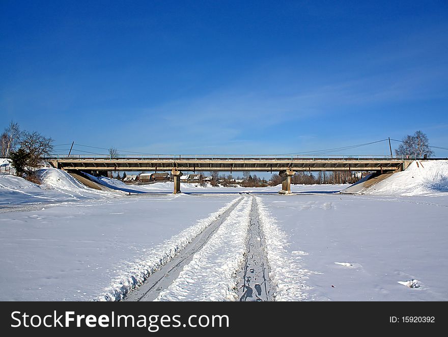 Car bridge through frozen river