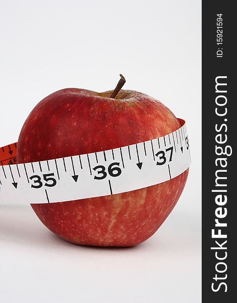 Closeup of an apple with 36 measurement
