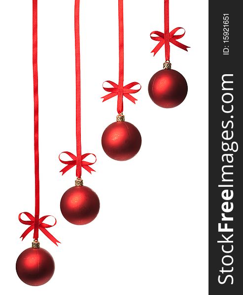 Christmas balls  with ribbons and bow on white background