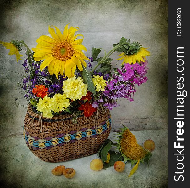 Basket with different, summer flowers. Basket with different, summer flowers