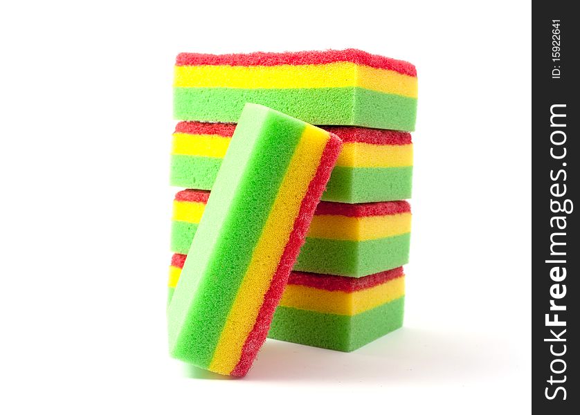Colorful sponges on white background