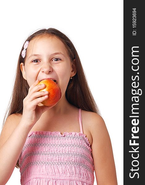 Nice little girl eating a delicious apple against white. Nice little girl eating a delicious apple against white.