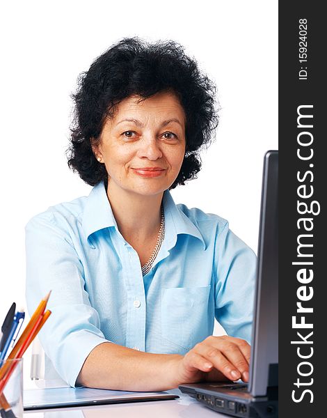 Elder woman using laptop on white background. Elder woman using laptop on white background.