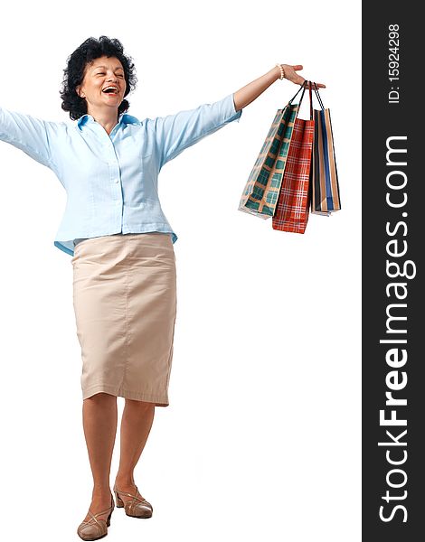 Senior Woman with shopping bags over white background. Senior Woman with shopping bags over white background.
