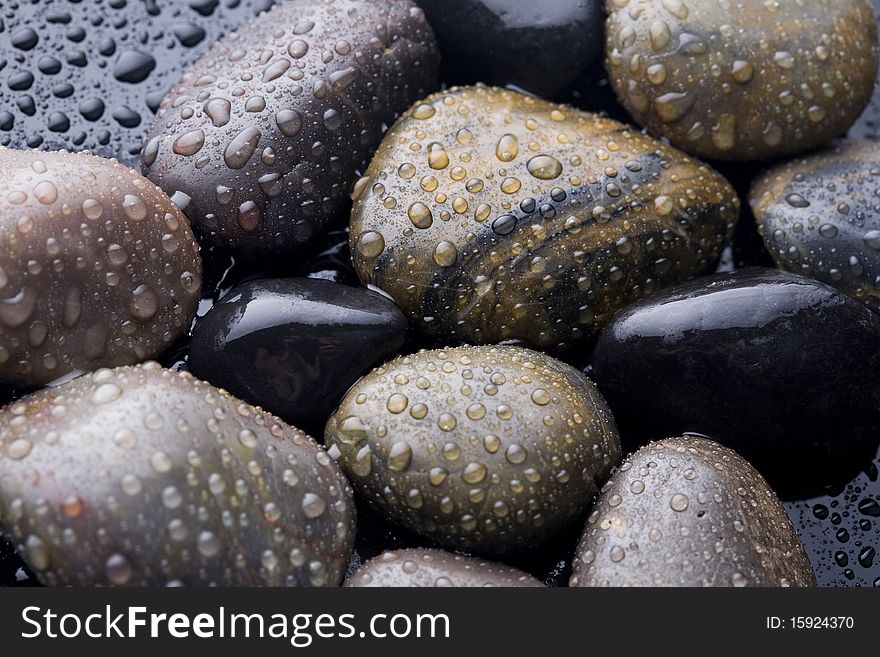 Stones covered with water drops.