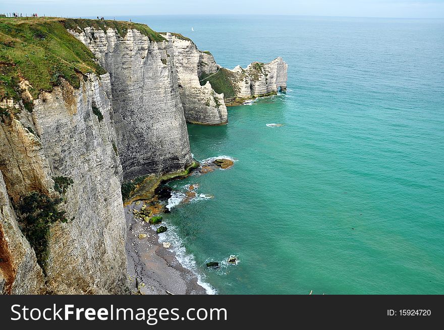 View in high cliffs pointing in a sea of emerald. View in high cliffs pointing in a sea of emerald