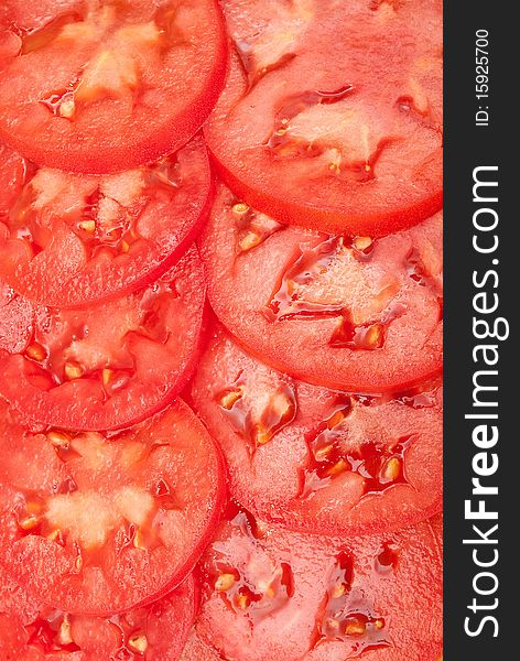 Pattern of red sliced tomatoes. Pattern of red sliced tomatoes