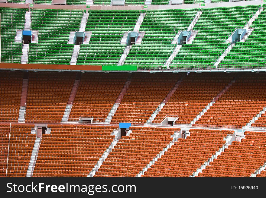 Colored chairs in a football stadium. Colored chairs in a football stadium