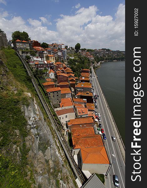 Wide Shot of Houses Built into Steep Rocky Hill, Porto, Portugal. Wide Shot of Houses Built into Steep Rocky Hill, Porto, Portugal