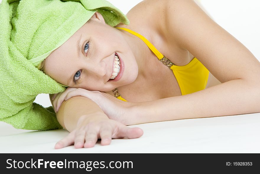 Portrait of woman with towel on head