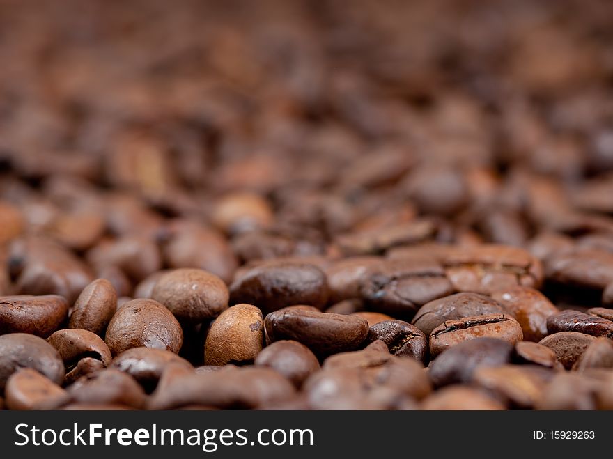 Closeup of roasted coffee beans. Closeup of roasted coffee beans.