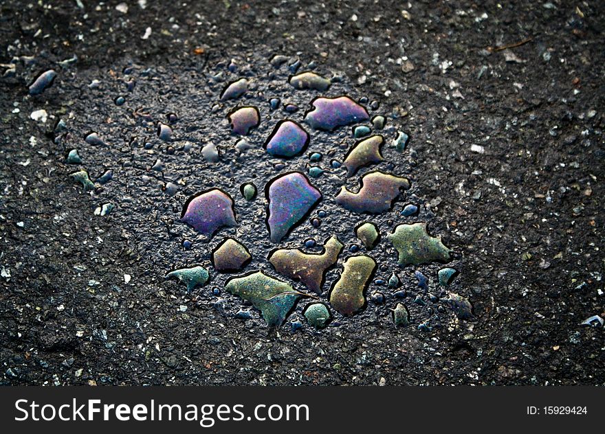 The colors Drops on asphalt