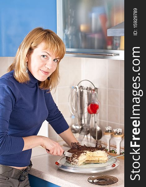 Smiling women with decorated cake. Smiling women with decorated cake