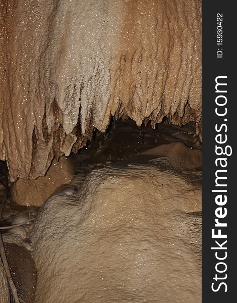 Stalactite formations in the cave with natural hot water, under Brige of Diabolo near Tatev monastery, Armenia. Stalactite formations in the cave with natural hot water, under Brige of Diabolo near Tatev monastery, Armenia