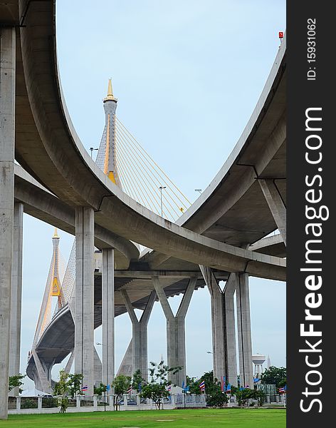 Curve of the suspension bridge with brighten sky view