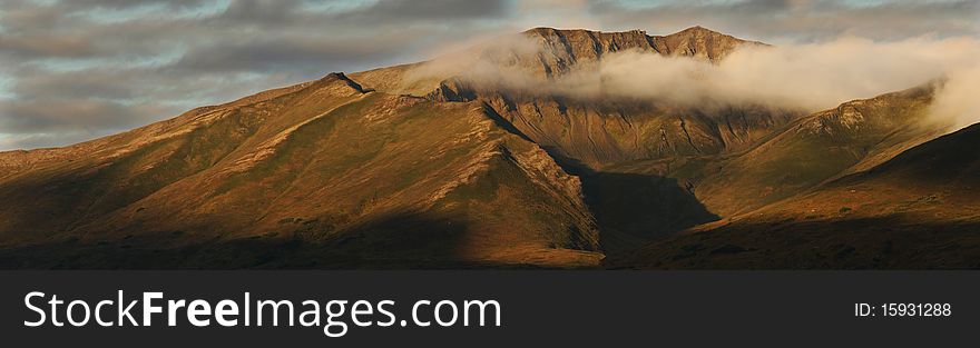 Alpenglow On Mountains In Hatcher Pass, Alaska