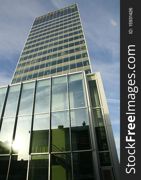 The sunset reflection in a window of a high building