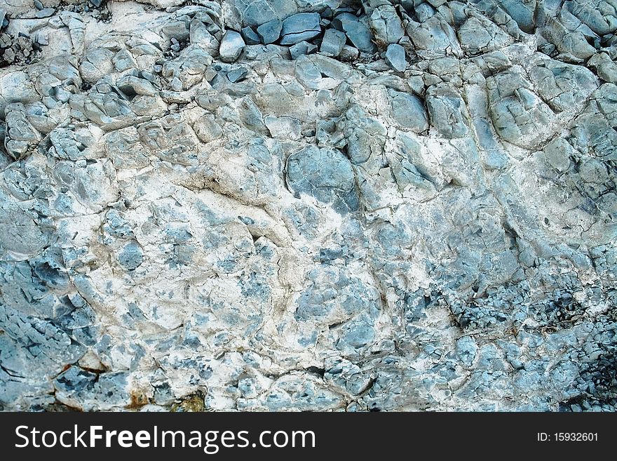 A sample of natural mountain rock texture. A sample of natural mountain rock texture