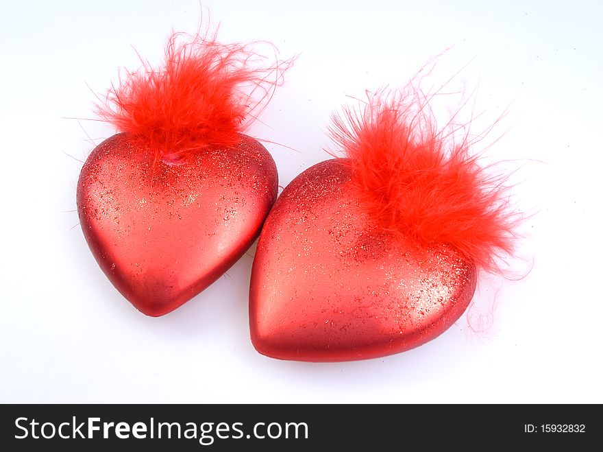 Christmas decorations are two red hearts. Christmas decorations are two red hearts