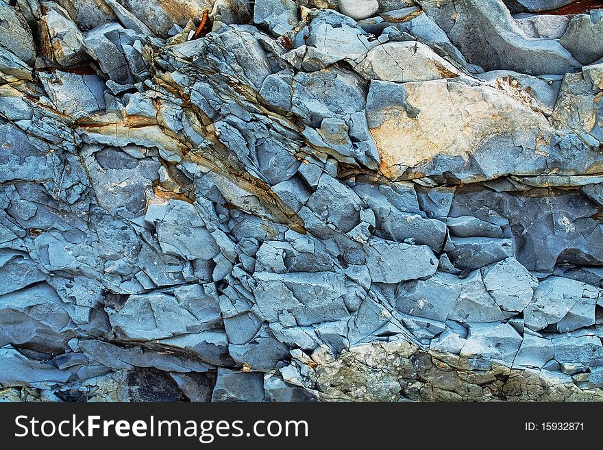 A sample of natural mountain rock texture. A sample of natural mountain rock texture